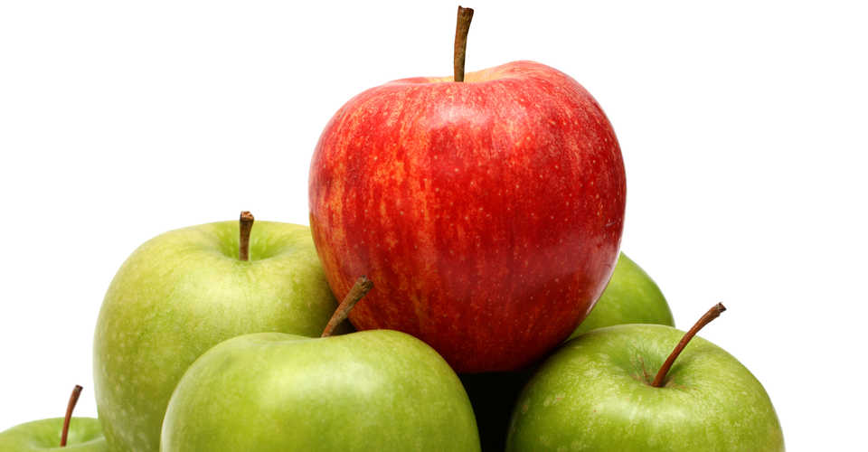 Picture of many green apples and a red one highlighting the top physician insurance in New Jersey.
